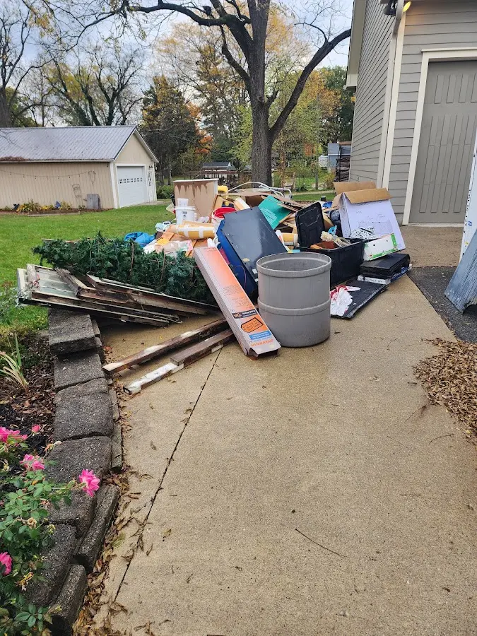 Dumpster being loaded with debris for Residential Dumpster Rental in Warminster